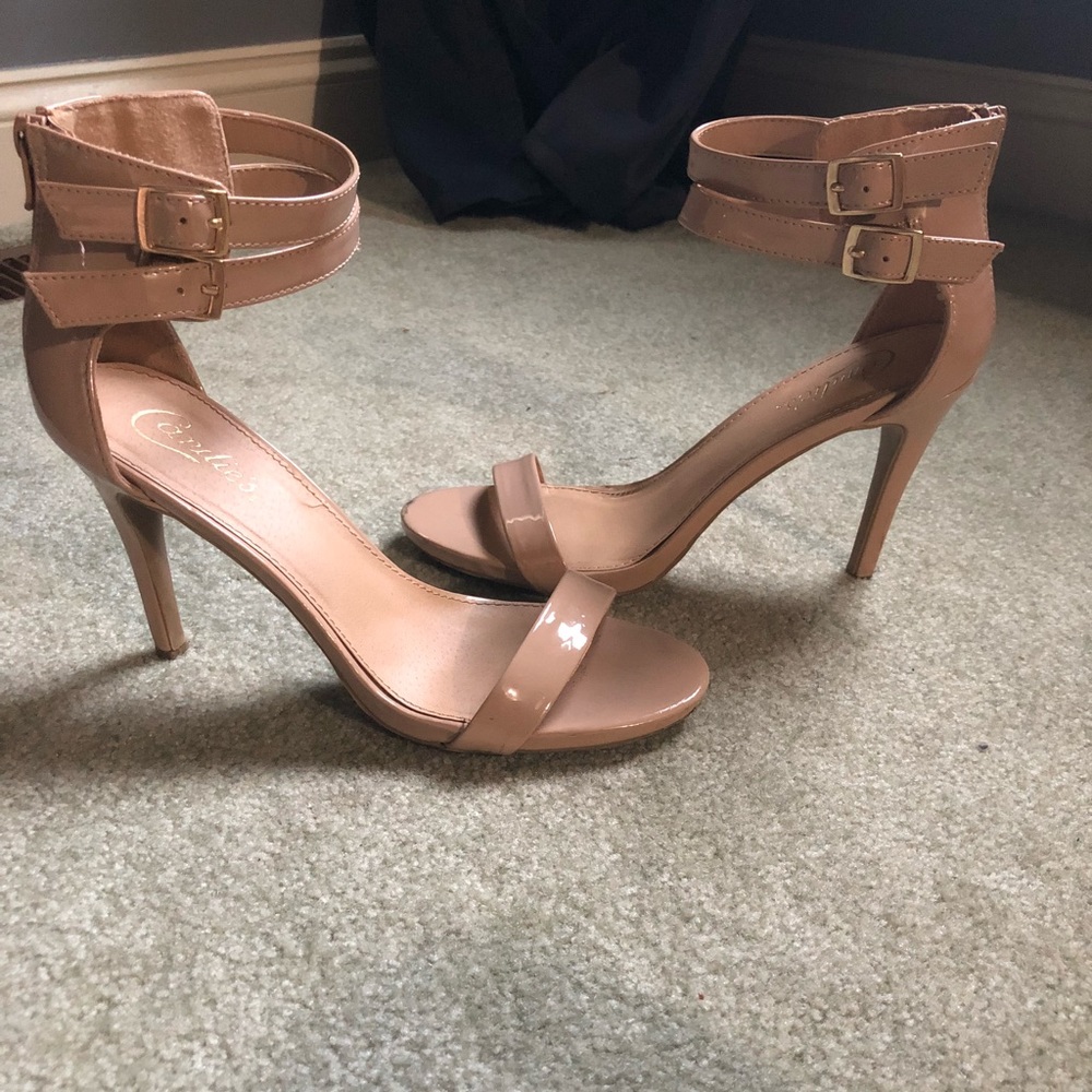 Candie’s Nude patent high heel pumps.
